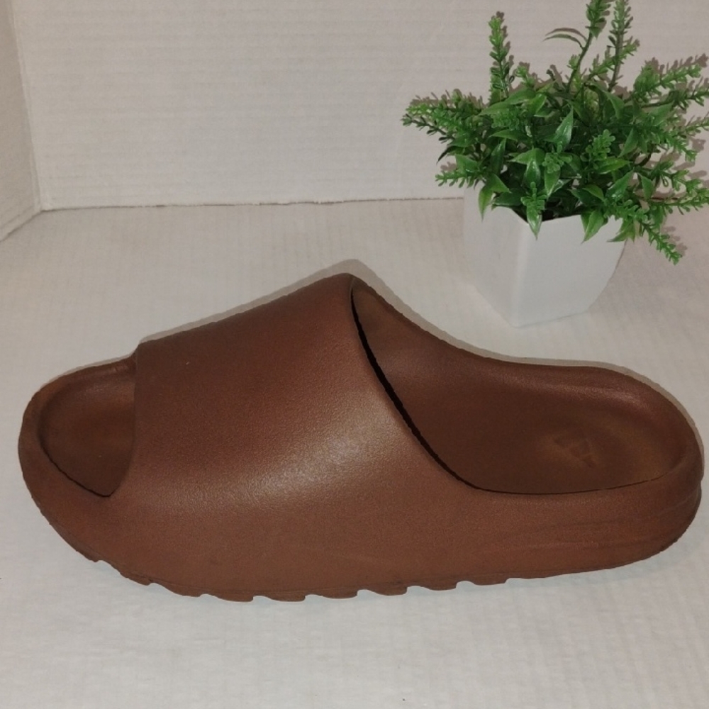 Yeezy Slides. Brown in Color. Men's size 10.